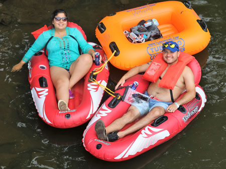 People rocket tubing rafting at riverside rentals winamac indiana